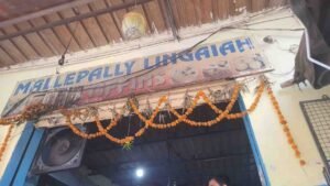 Mallepally Lingaiah Tiffins shop entrance decorated with garlands in Hyderabad