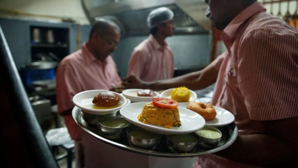 MTR staff serving traditional South Indian meal on tray in Bengaluru