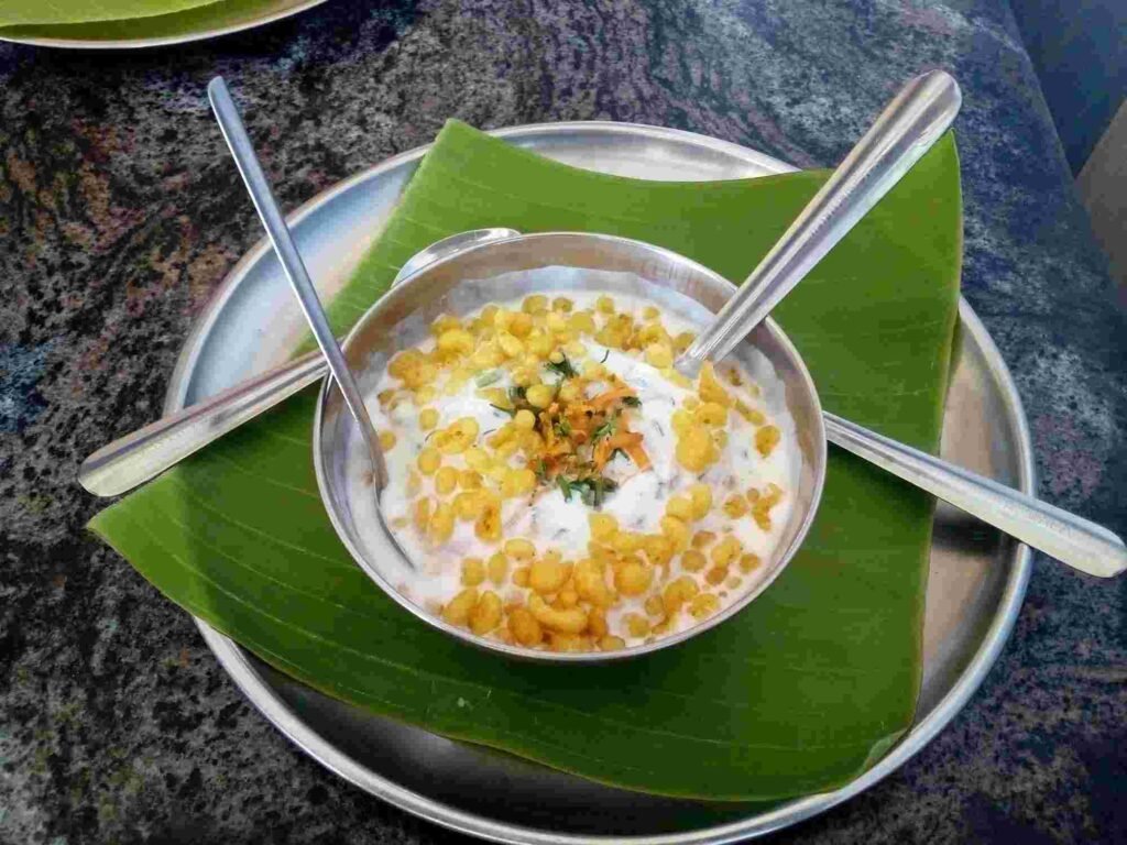 Curd Vada served at Preeti Canteen Honnavar topped with boondi and fresh coriander