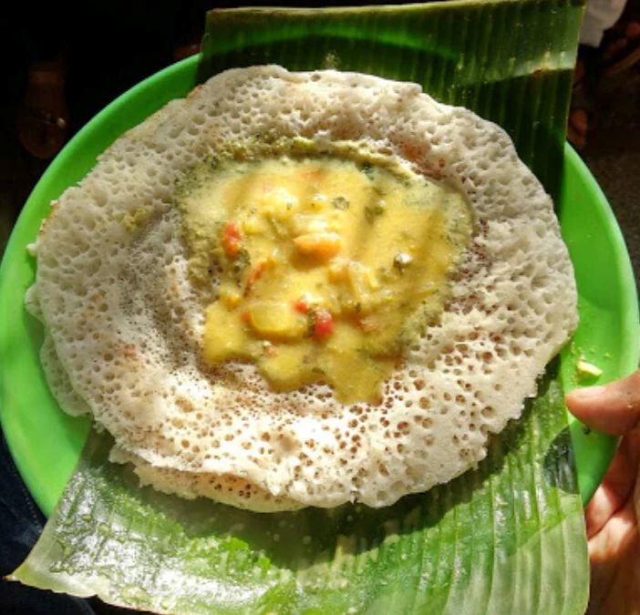 Crispy benne dosa served with chutney at Siddappa Hotel Bengaluru