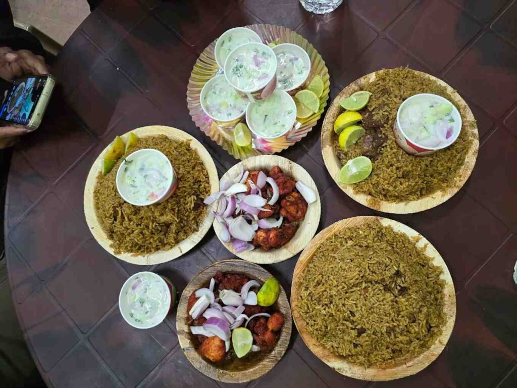 Donne style chicken and mutton biryani served with raita and onion salad at Mani’s Dum Biryani Hoskote