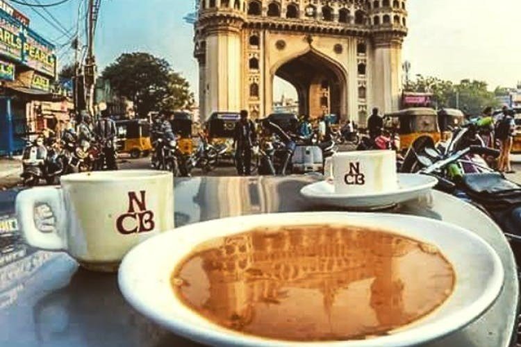 Irani chai served at Nimrah Cafe with Charminar view in Hyderabad