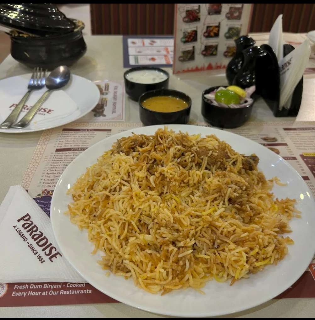 Chicken Dum Biryani served at Paradise Biryani Secunderabad with salan and raita