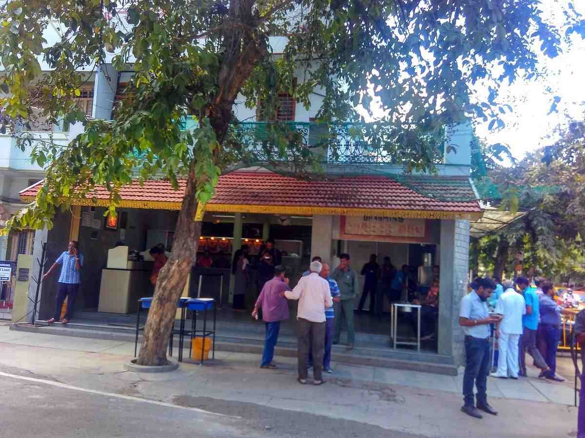 Exterior view of Brahmin Coffee Bar in Basavanagudi Bengaluru with customers standing outside