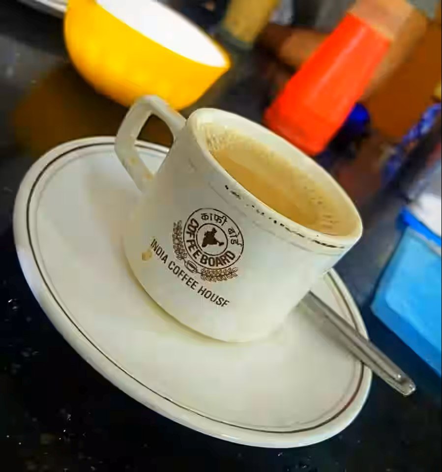 Indian Coffee House filter coffee served in white cup with saucer in Bengaluru