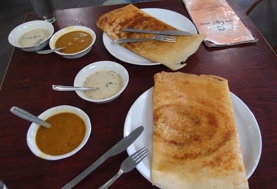 Crispy masala dosa served with chutney and sambar at Indian Coffee House Bengaluru