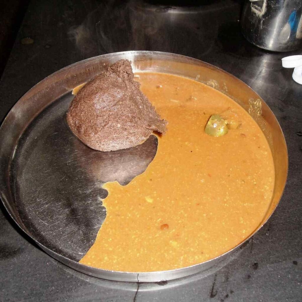 Ragi mudde served with bassaru at Mudde Madappa Mess Bengaluru