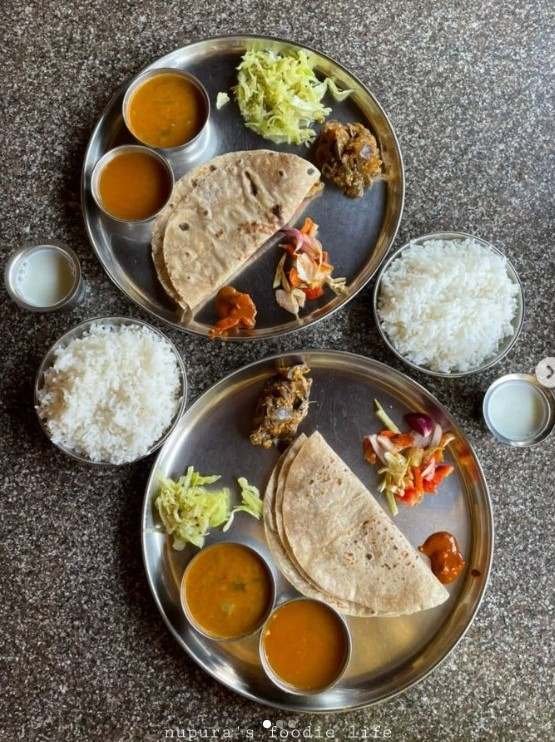 Unlimited veg thali with chapati, rice, rasam, sambar, sabji, salad and buttermilk served at Dattaprasad Tiffin Canteen in Gokarna.