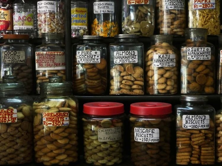 Glass jars filled with assorted biscuits and nankhatai at Kyani & Co Mumbai Irani bakery