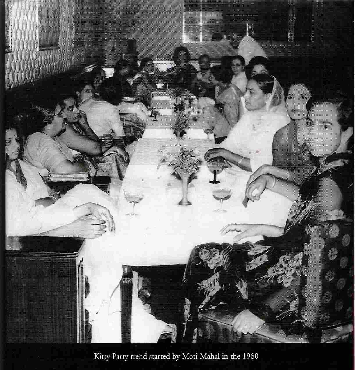 Vintage black and white photo of diners at Moti Mahal Delhi during 1960s showcasing early dining culture