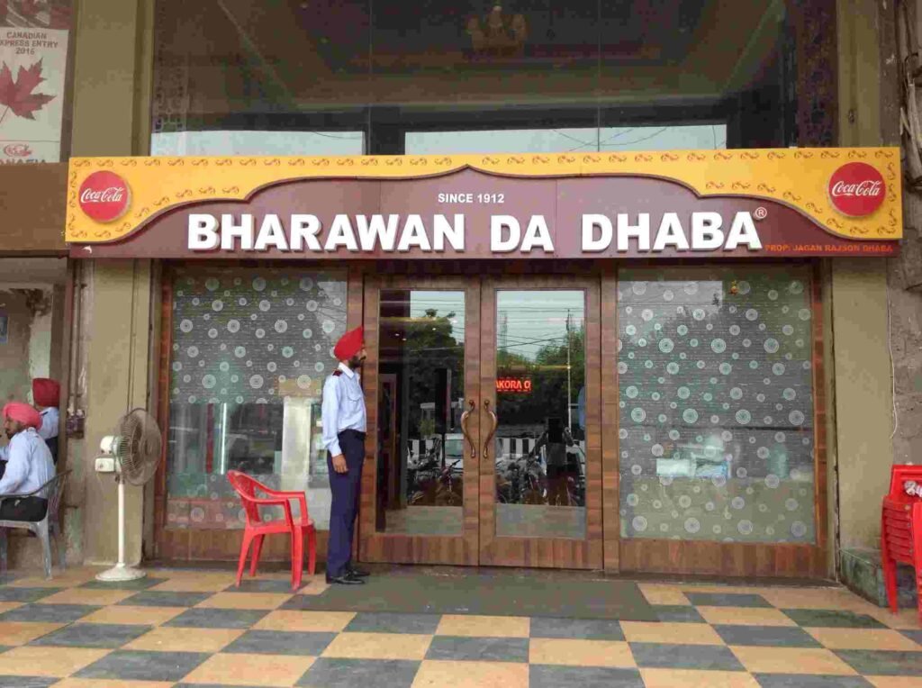 Bharawan Da Dhaba Amritsar entrance signboard since 1912 restaurant exterior