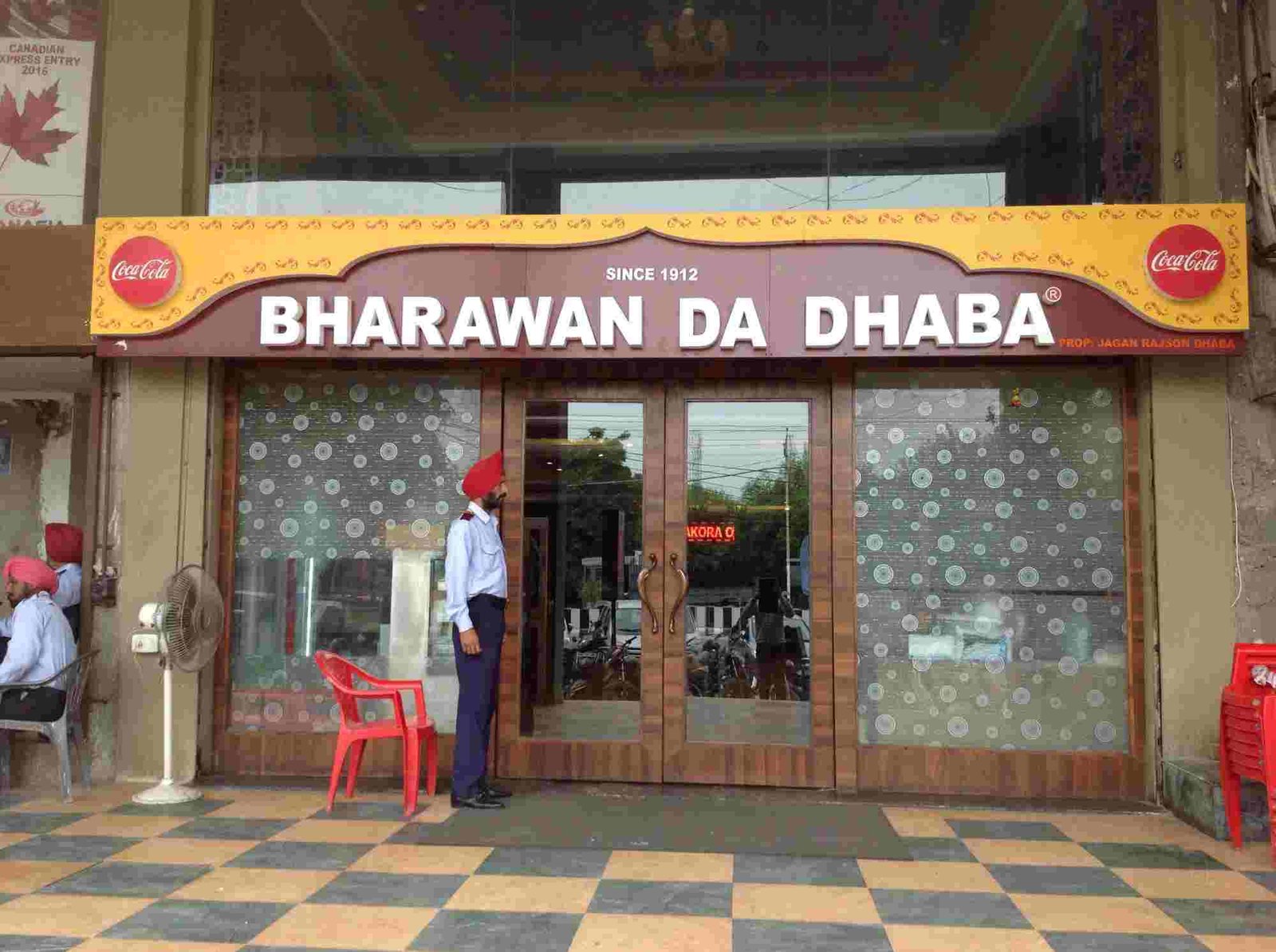 Bharawan Da Dhaba Amritsar entrance signboard since 1912 restaurant exterior