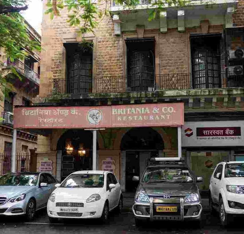 Britannia & Co Mumbai exterior view with parked cars at Ballard Estate