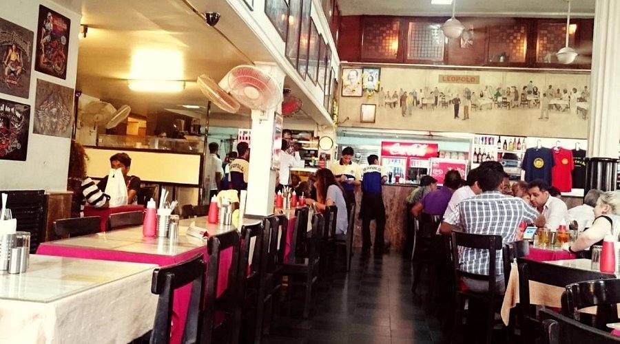 Leopold Cafe Mumbai interior seating crowded dining vintage decor Colaba