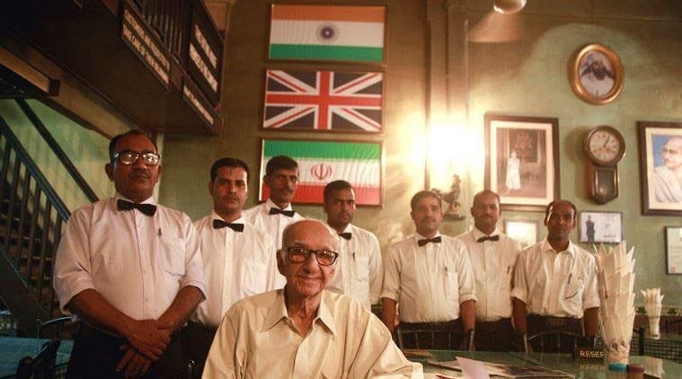 Boman Kohinoor with staff inside Britannia & Co Parsi restaurant Mumbai