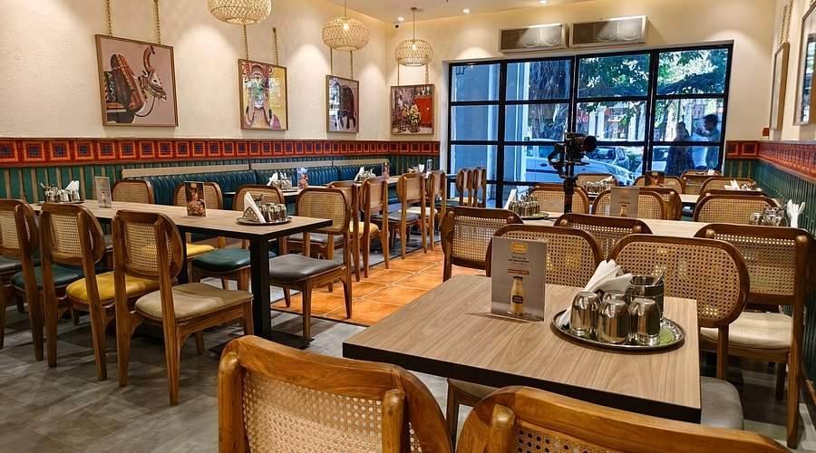 Indian Coffee House Connaught Place interior with vintage seating and classic cafe ambiance