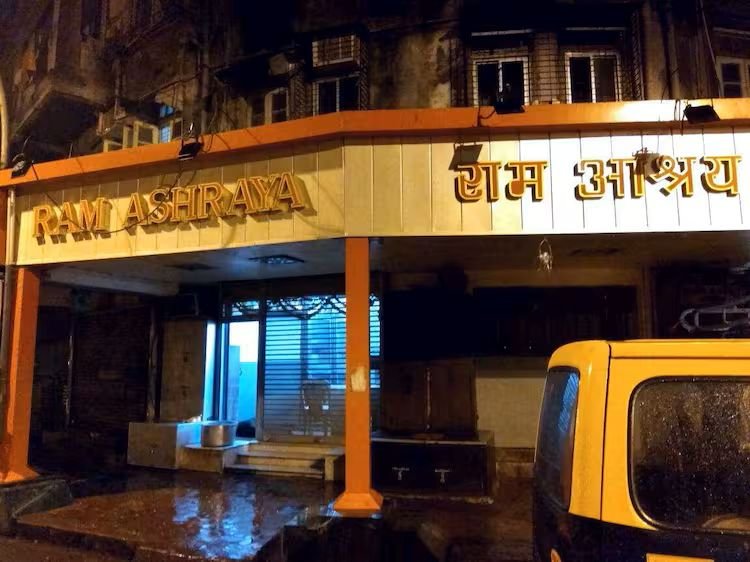 Ram Ashraya restaurant exterior in Matunga Mumbai illuminated at night