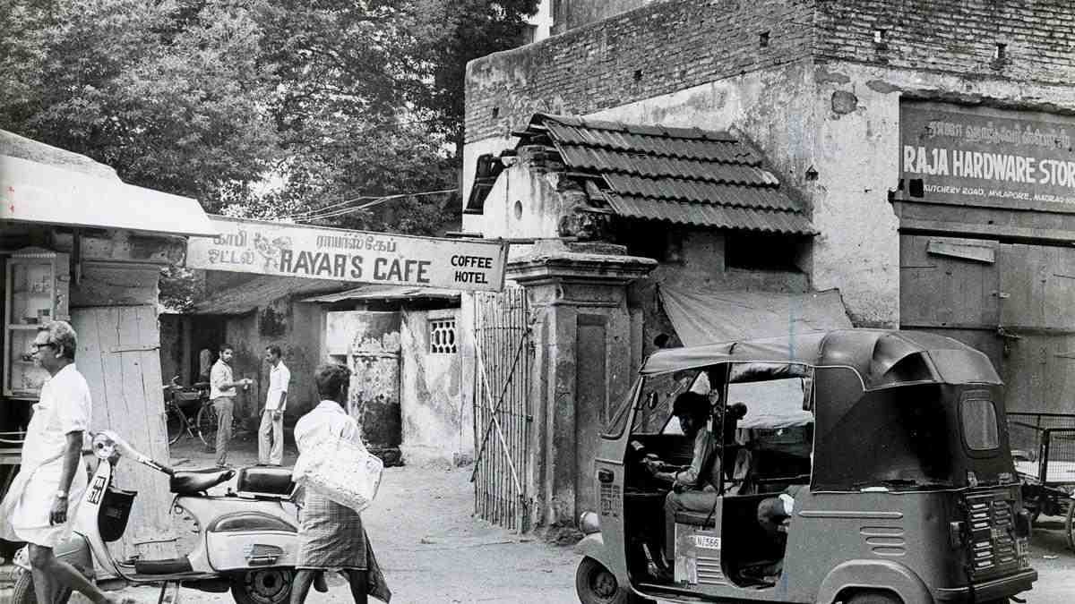 Rayar’s Cafe old exterior view in Mylapore Chennai with vintage auto and street scene