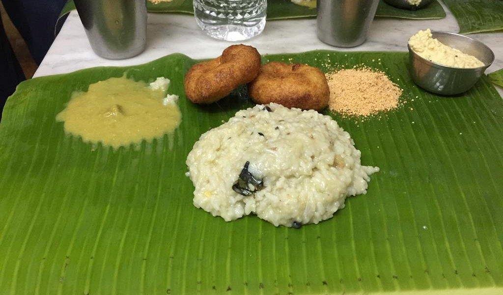 South Indian pongal vada served on banana leaf at Rayar’s Mess Chennai