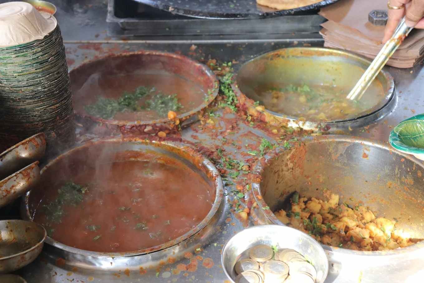 Spicy chole and aloo sabzi being prepared at Garg Puri Wale Ambala