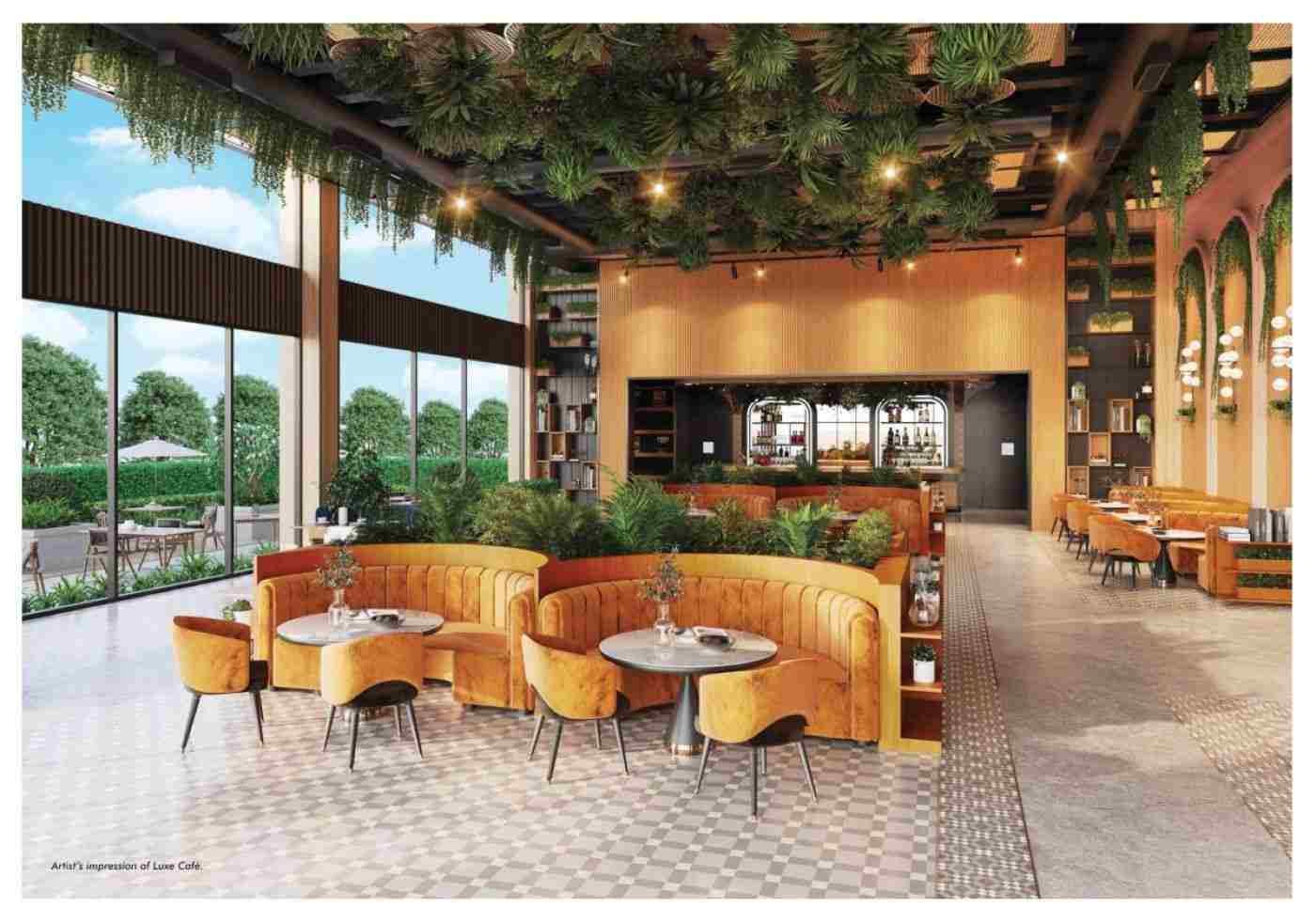 Modern interior of The Laughing B café in Bengaluru with stylish seating and greenery decor