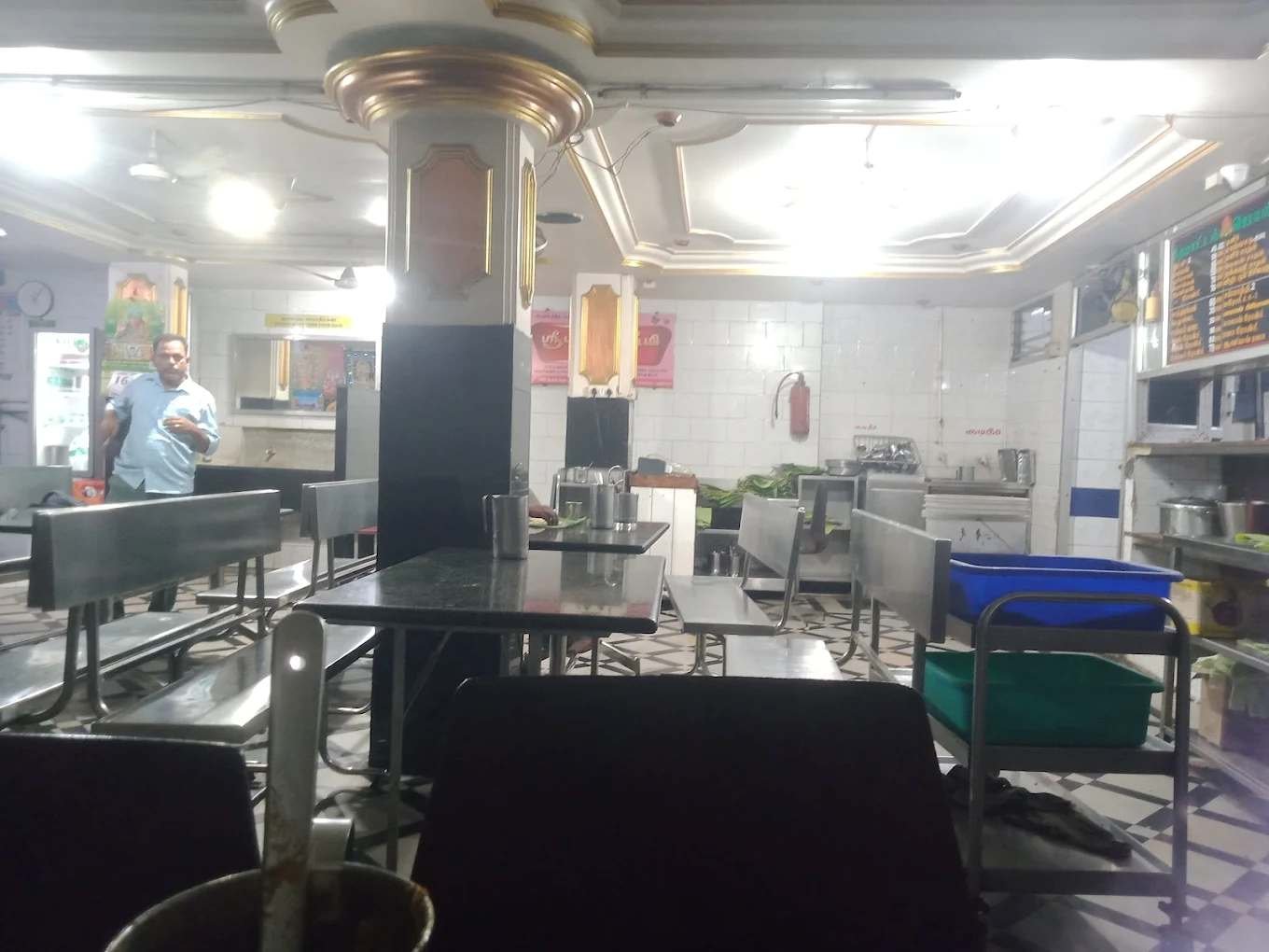 Interior seating area of Hotel Ponni Pure Veg Restaurant in Dharmapuri with traditional dining setup and clean ambience