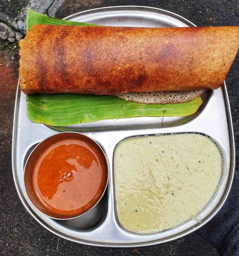 Crispy Masala Dosa served with red chutney and coconut chutney at S N Refreshments Bengaluru.