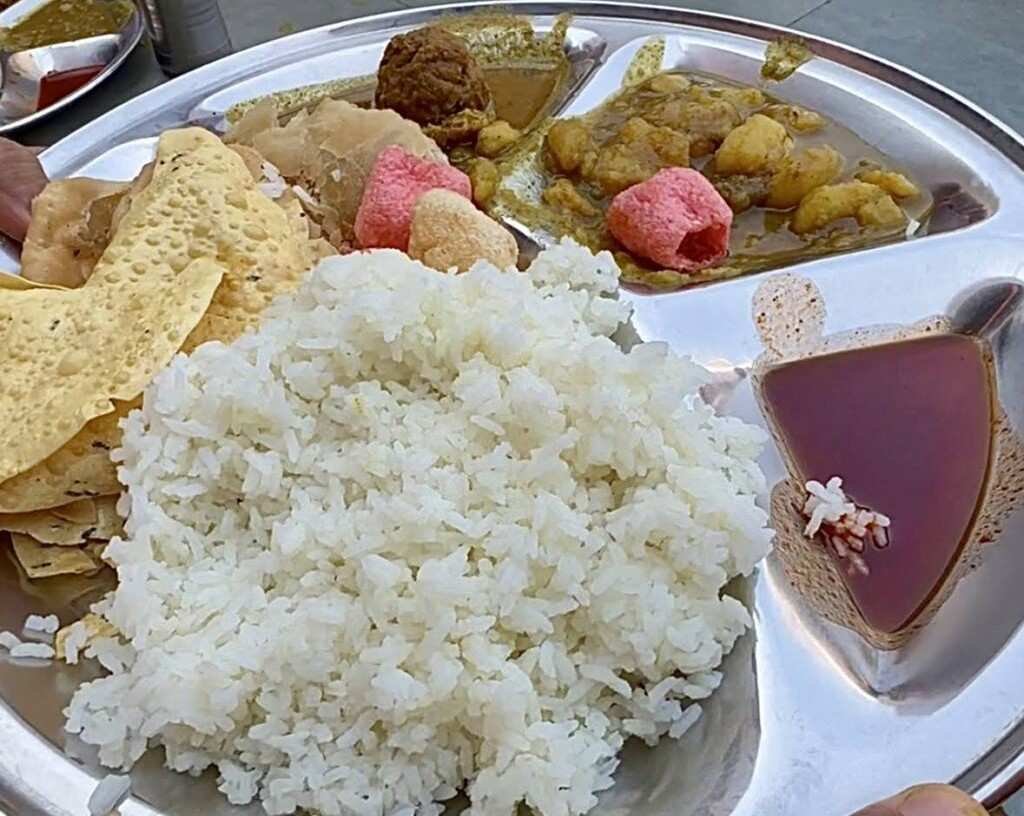 Sattvic thali with rice, sabzi, papad and prasad served at Shri Ram Rasoi Ayodhya