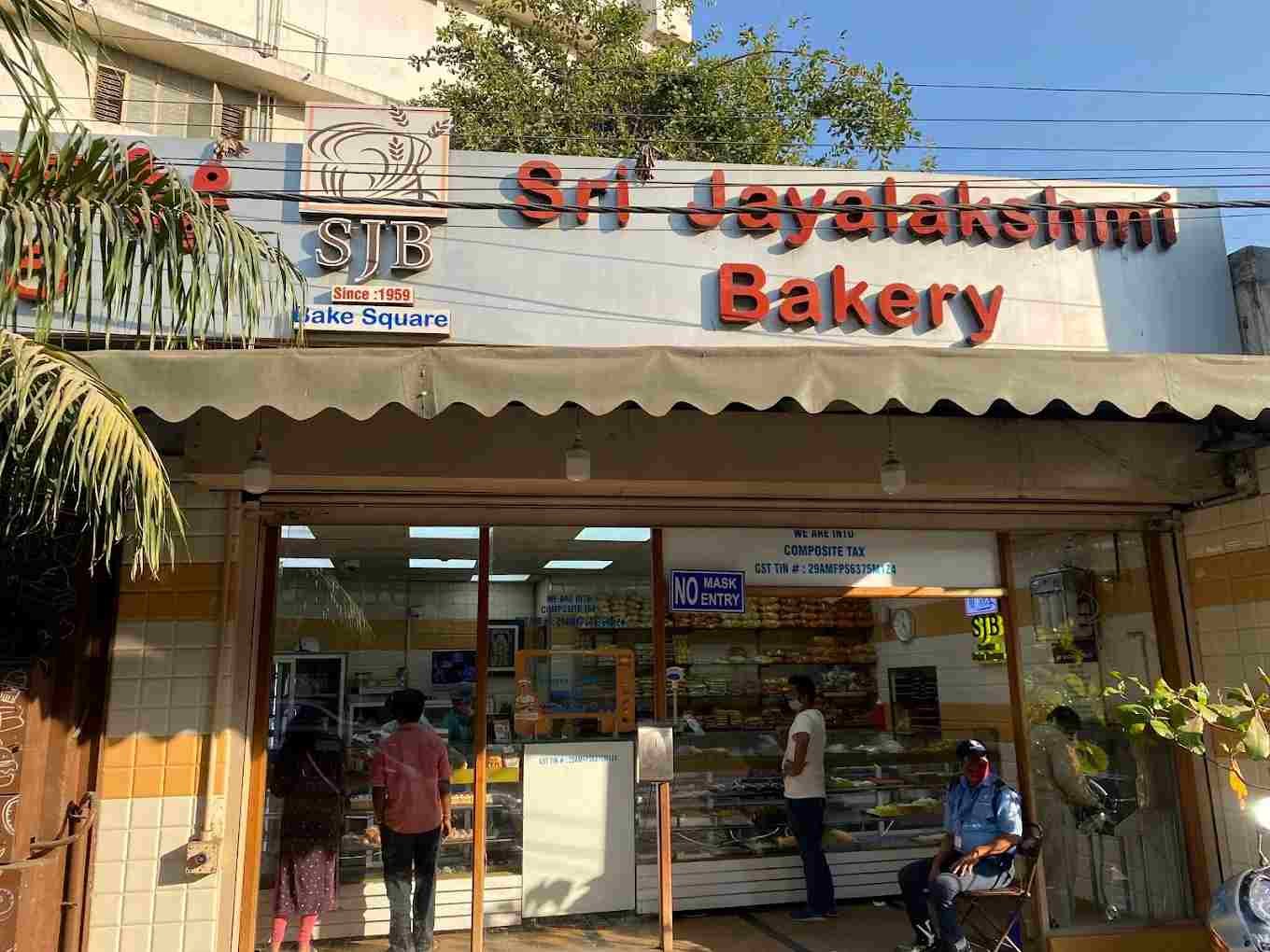 Front view of Sri Jayalakshmi Bakery in Bengaluru with bakery signage and entrance during daytime.Front view of Sri Jayalakshmi Bakery in Bengaluru with bakery signage and entrance during daytime.