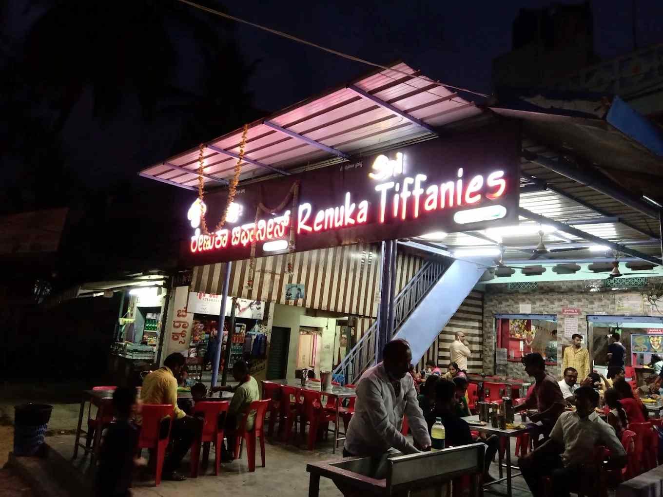 Evening view of Shri Renuka Tiffins in Bidadi with diners enjoying authentic Karnataka breakfast and tiffin dishes.
