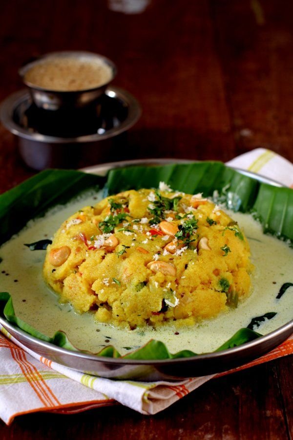 Khara Bath served on a banana leaf with coconut chutney and South Indian filter coffee.
